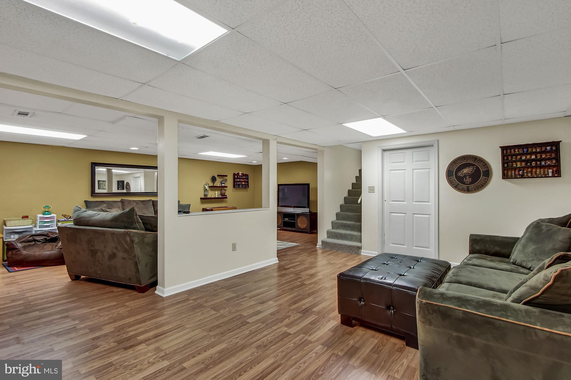 10 Boxwood Road Manchester, PA 17345 - Photo 17 of 25 large family room in basement with laminate floors