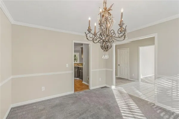 a view of a chandelier in a room