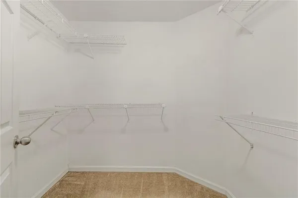 a view of a room with racks on the wall