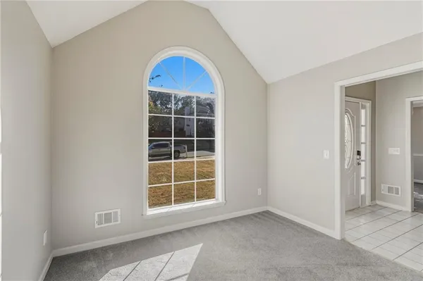 an empty room with windows