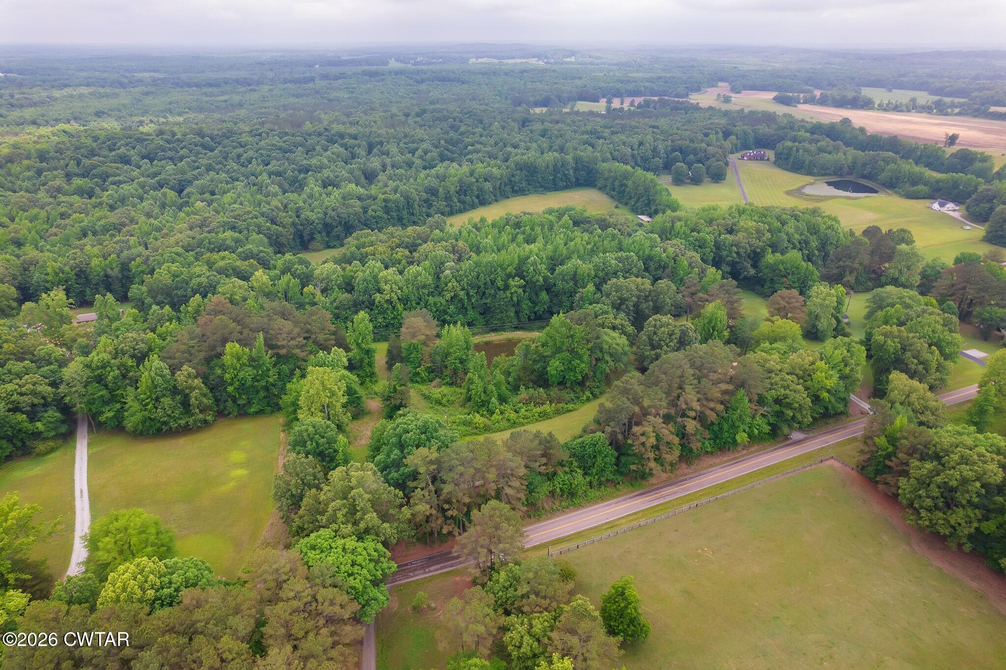4080 Beech Bluff Road Beech Bluff, TN 38313 - Photo 9 of 41 an aerial view of valley and lake