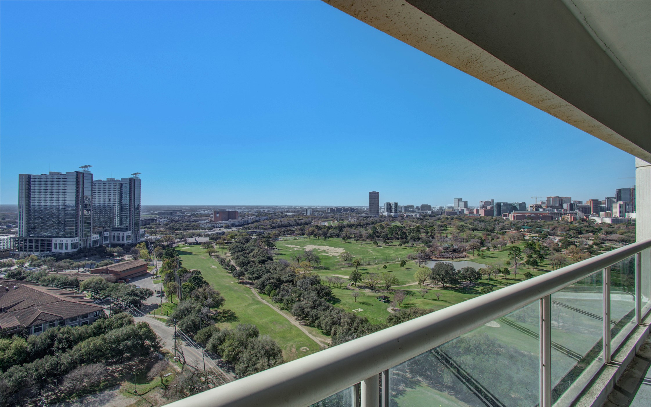 1701 Hermann Drive, Unit 20D Houston, TX 77004 - Photo 23 of 35 a view of a city skyline from a balcony