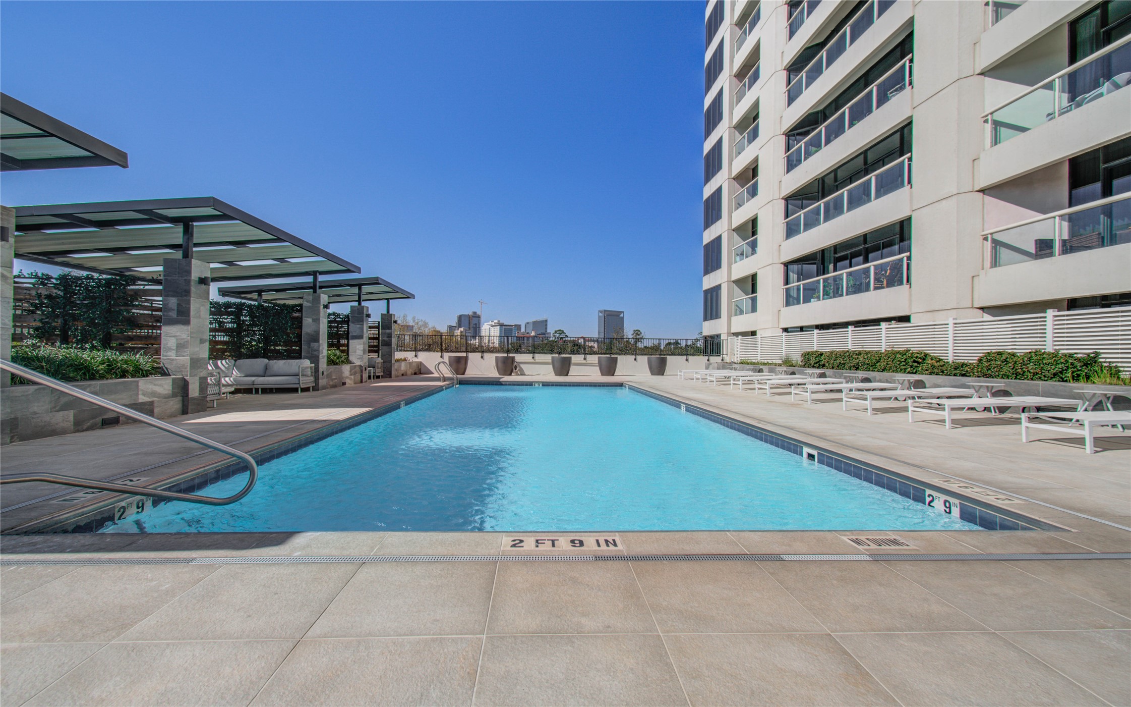 1701 Hermann Drive, Unit 20D Houston, TX 77004 - Photo 29 of 35 a view of pool with outdoor seating