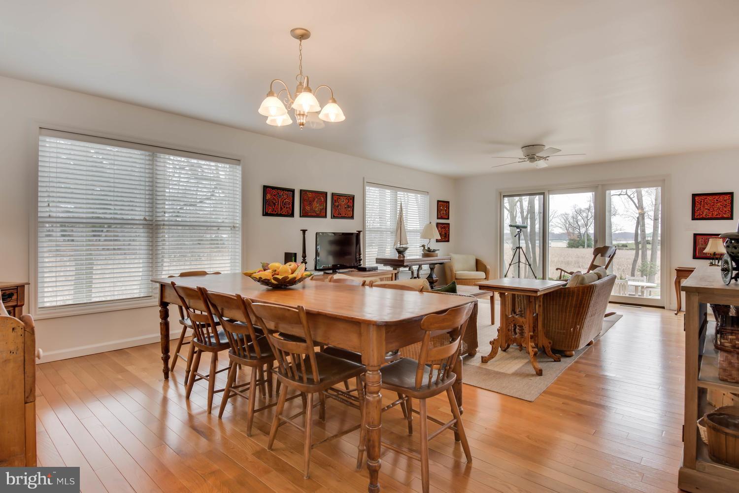 29030 Belchester Road Kennedyville, MD 21645 - Photo 13 of 30 a view of a dining room with furniture window and wooden floor