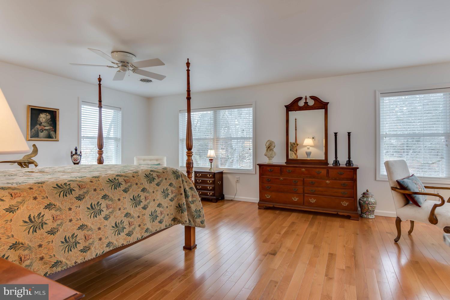 29030 Belchester Road Kennedyville, MD 21645 - Photo 18 of 30 a bed room with a bed and a dresser