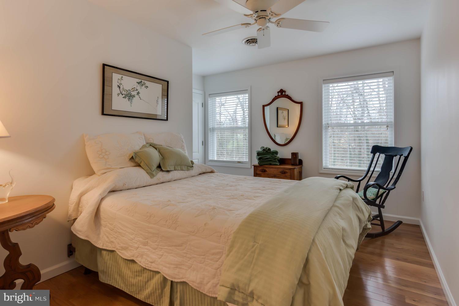 29030 Belchester Road Kennedyville, MD 21645 - Photo 23 of 30 a bed room with a bed window and a chair