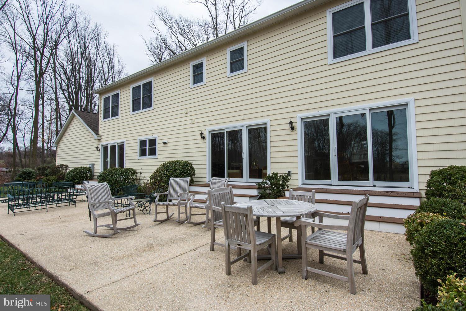 29030 Belchester Road Kennedyville, MD 21645 - Photo 5 of 30 a view of a house with patio and a garden