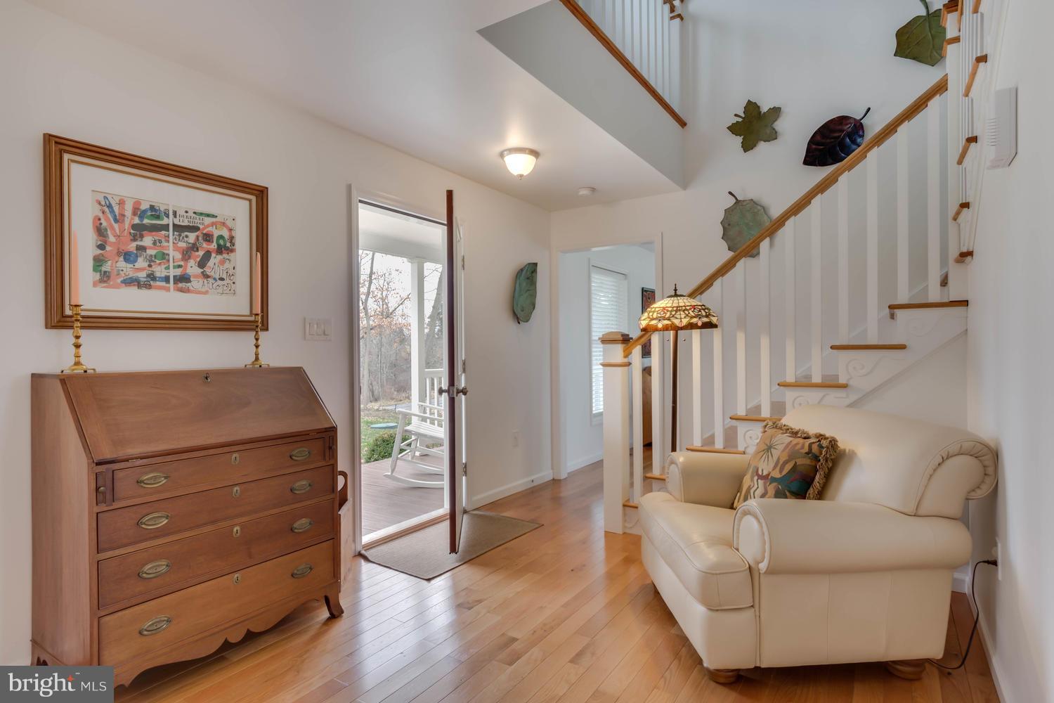 29030 Belchester Road Kennedyville, MD 21645 - Photo 7 of 30 a living room with furniture and a baby crib