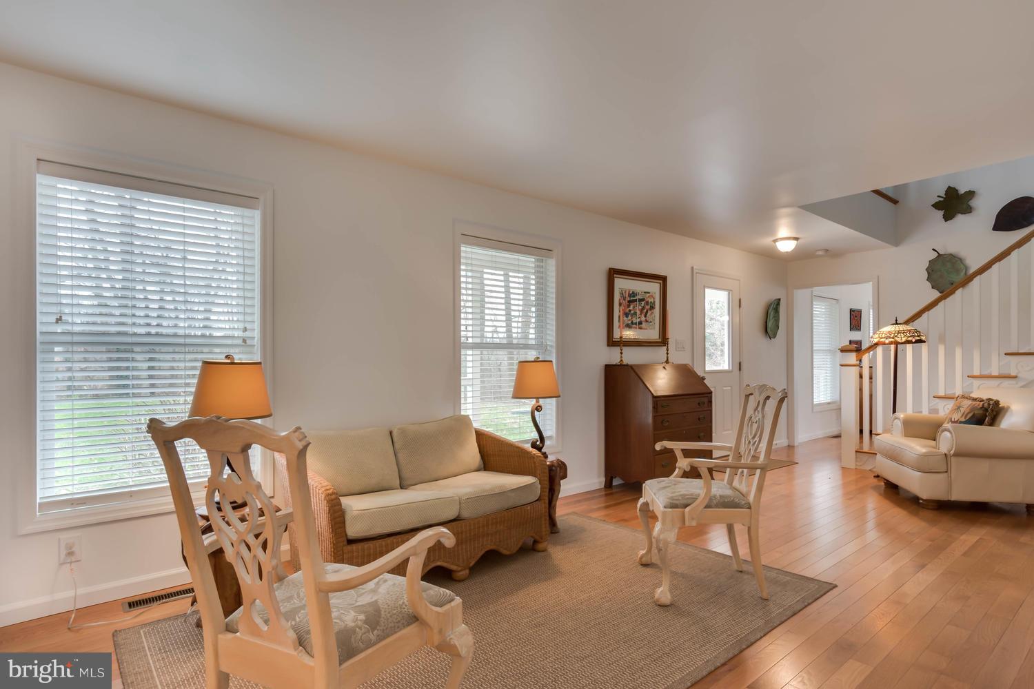 29030 Belchester Road Kennedyville, MD 21645 - Photo 8 of 30 a living room with furniture and wooden floor