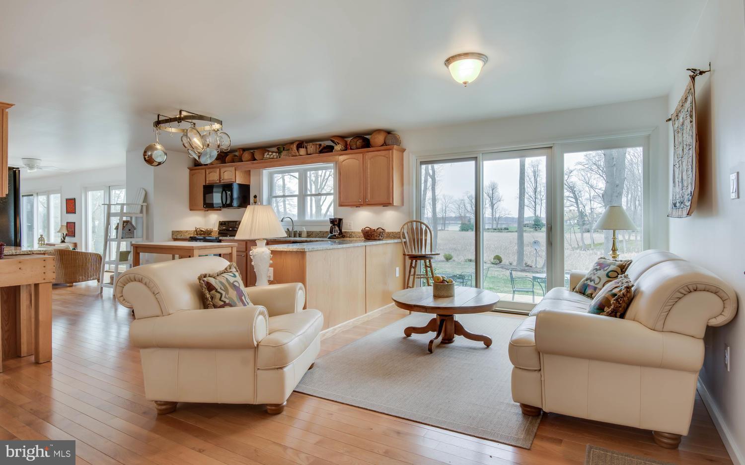 29030 Belchester Road Kennedyville, MD 21645 - Photo 10 of 30 a living room with furniture and a large window