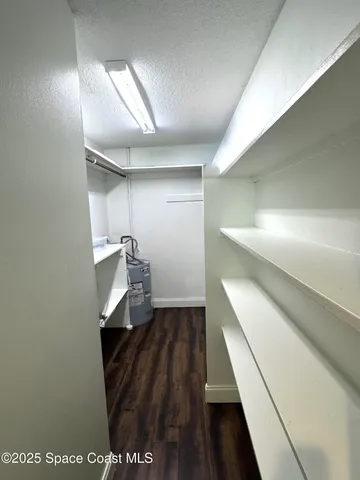 a view of a swimming pool with a yard