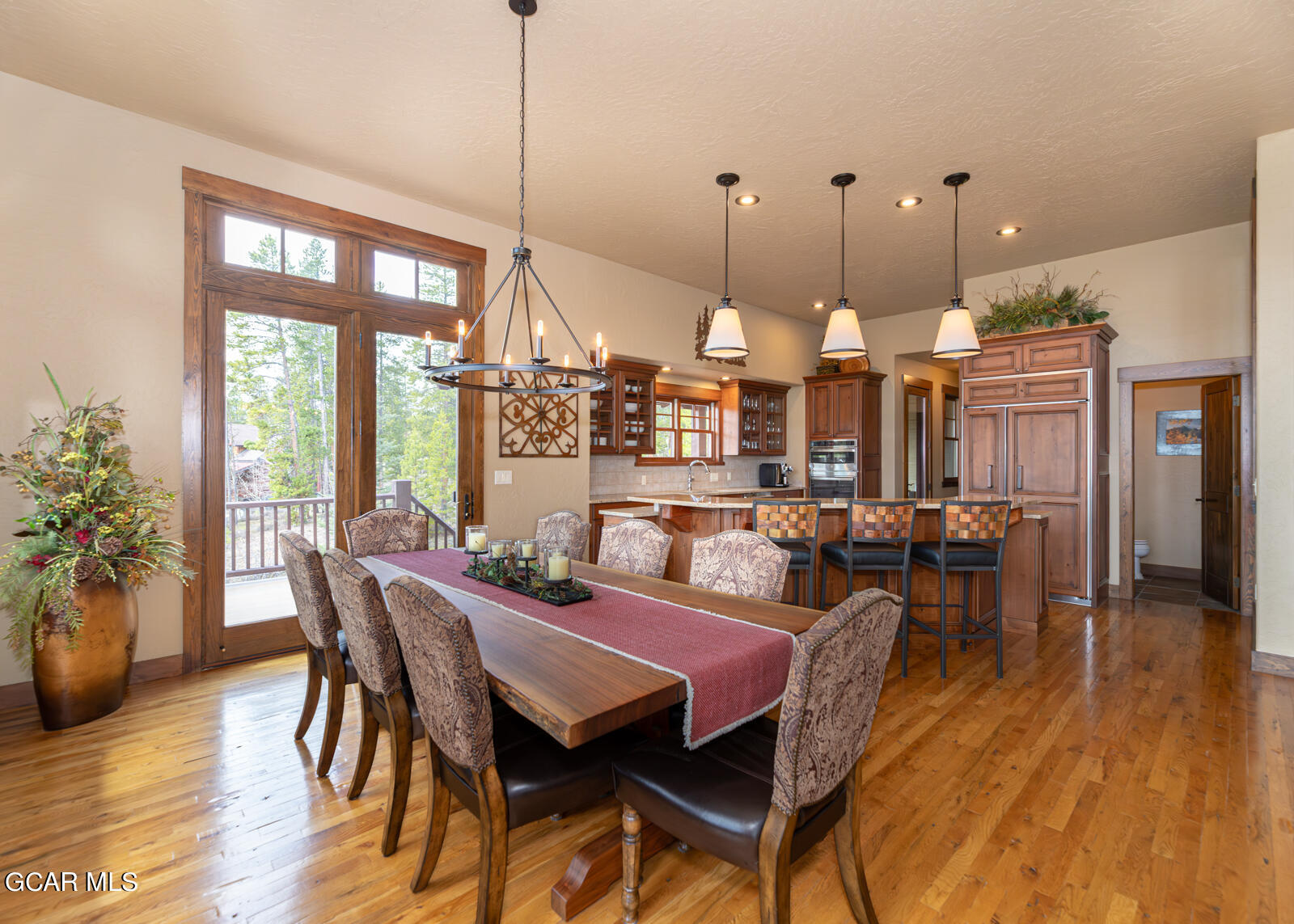 40 Golf Course Circle Tabernash, CO 80478 - Photo 14 of 57 a view of a dining room with furniture window and wooden floor