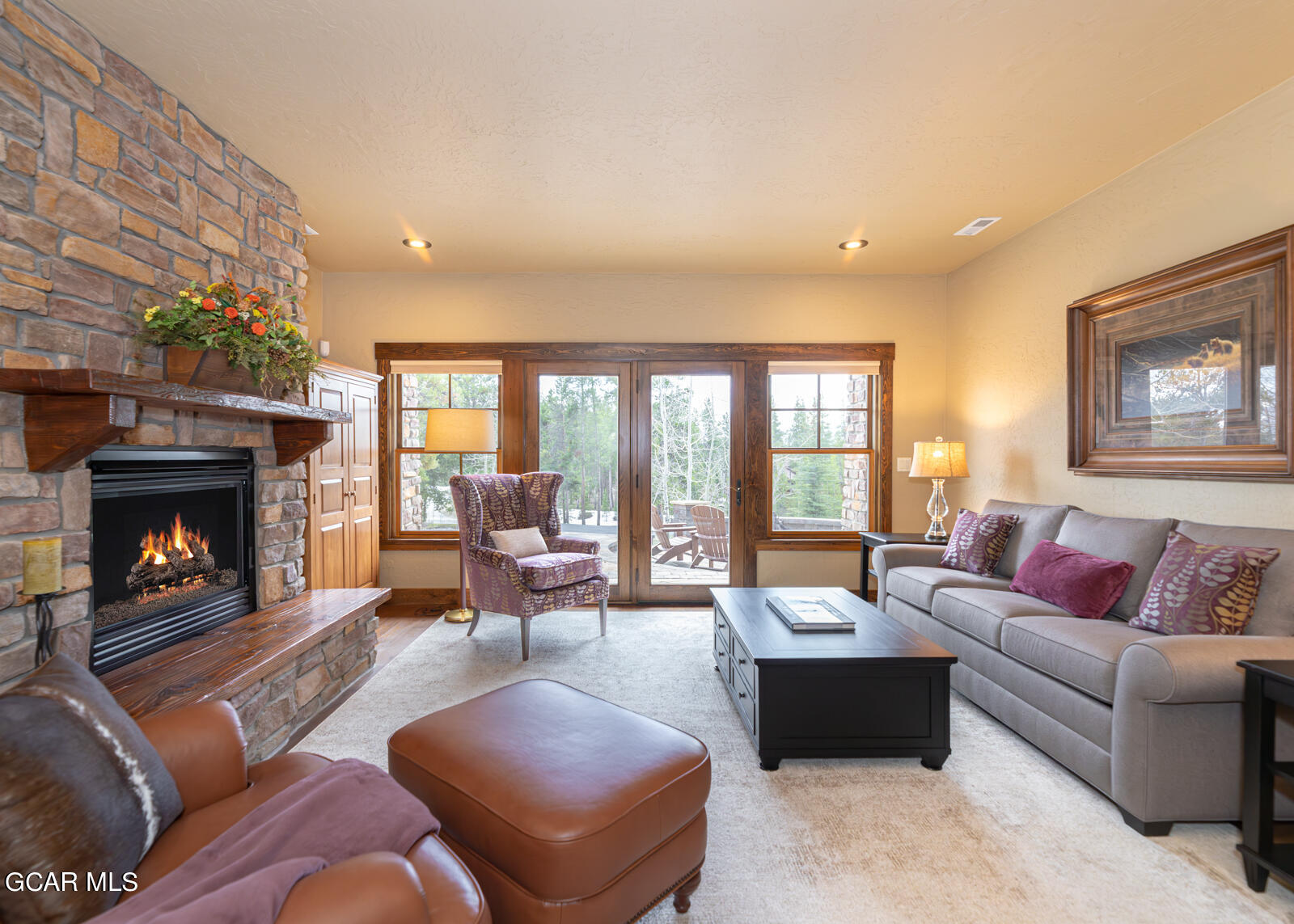 40 Golf Course Circle Tabernash, CO 80478 - Photo 23 of 57 a living room with furniture and a fireplace