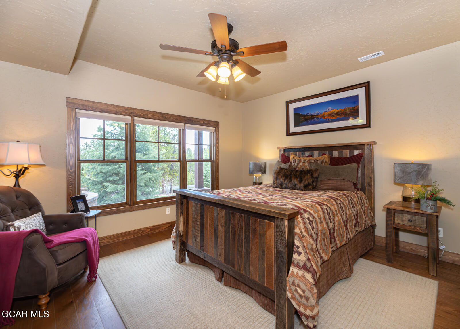 40 Golf Course Circle Tabernash, CO 80478 - Photo 26 of 57 a bedroom with a bed and a couch