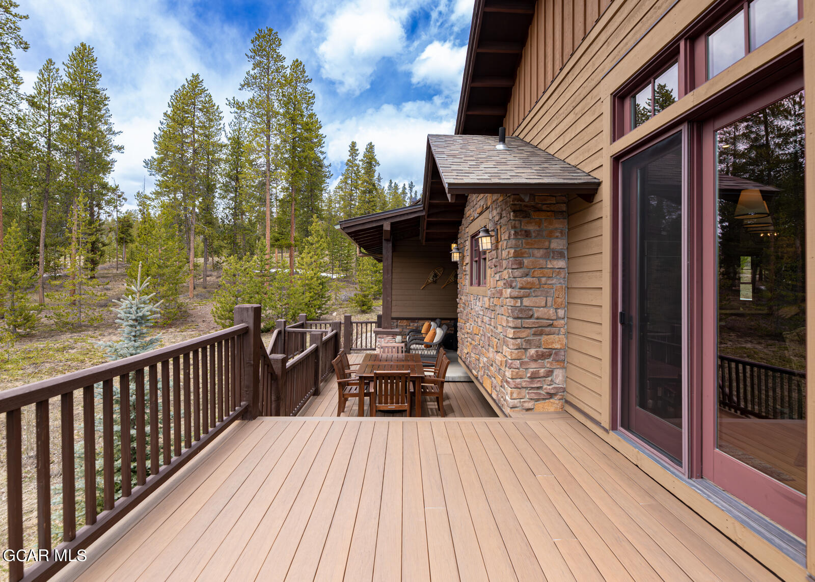 40 Golf Course Circle Tabernash, CO 80478 - Photo 36 of 57 a view of a wooden deck with a yard