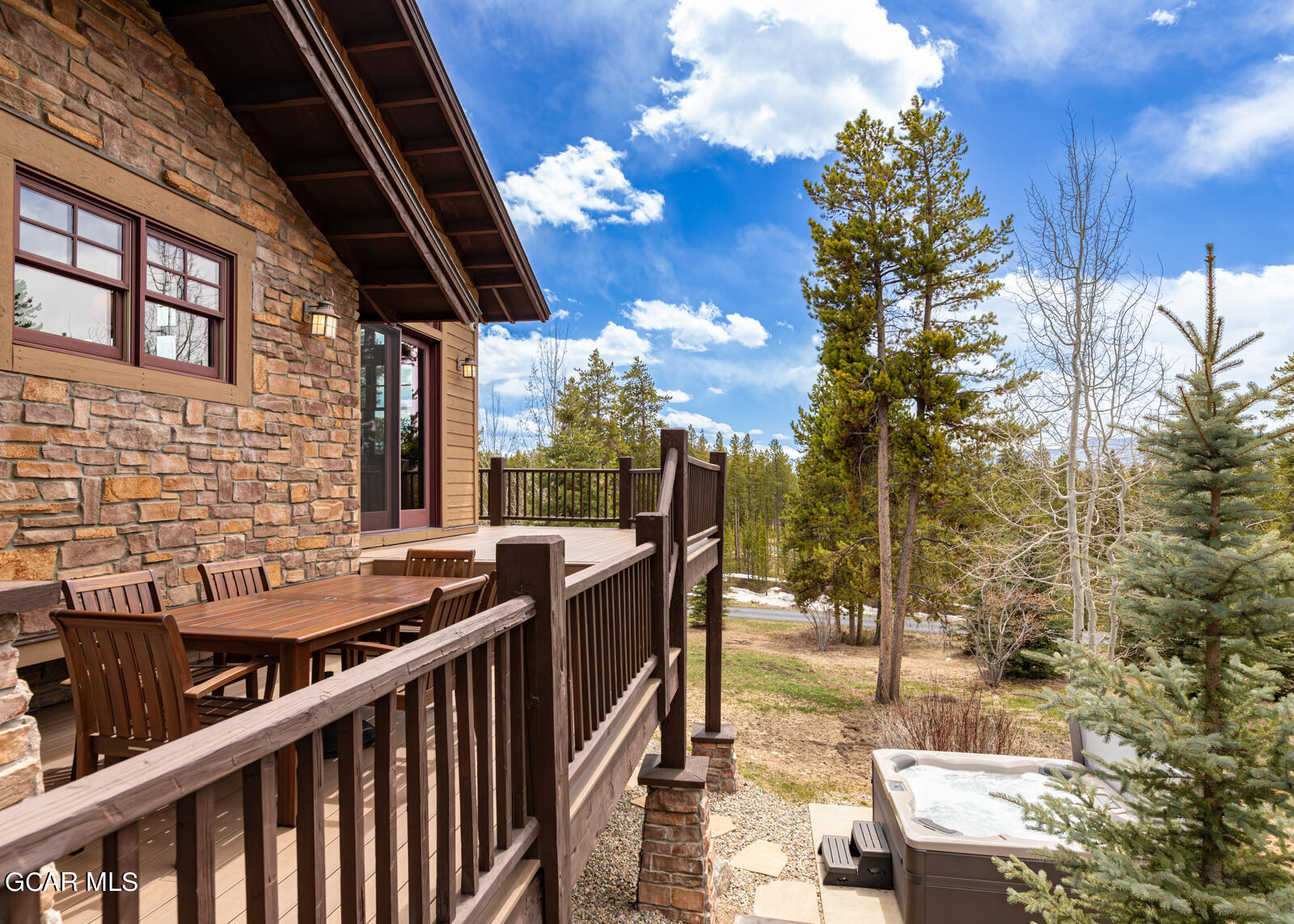 40 Golf Course Circle Tabernash, CO 80478 - Photo 37 of 57 a view of balcony with wooden floor and outdoor seating