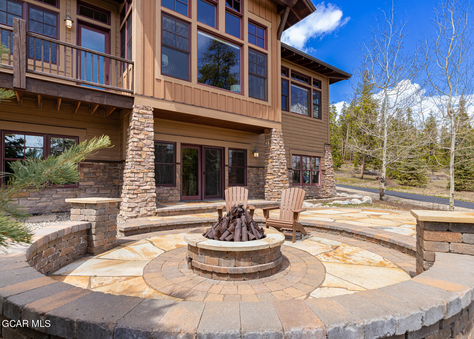 40 Golf Course Circle Tabernash, CO 80478 - Photo 39 of 57 a view of a house with backyard and sitting area