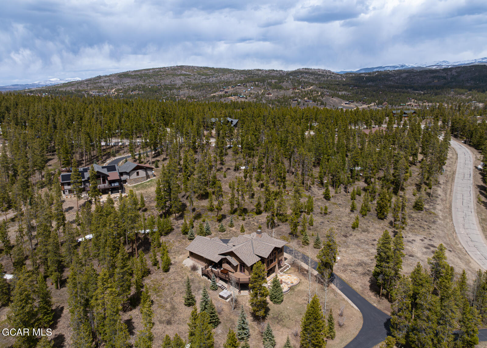 40 Golf Course Circle Tabernash, CO 80478 - Photo 46 of 57 a view of a city with mountains in the background
