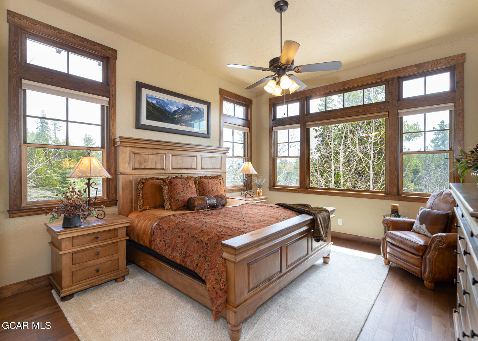 40 Golf Course Circle Tabernash, CO 80478 - Photo 8 of 57 a bedroom with a bed couch and window