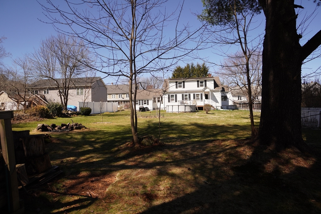 25 A Street Warren, MA 01092 - Photo 31 of 36 a front view of a house with a yard