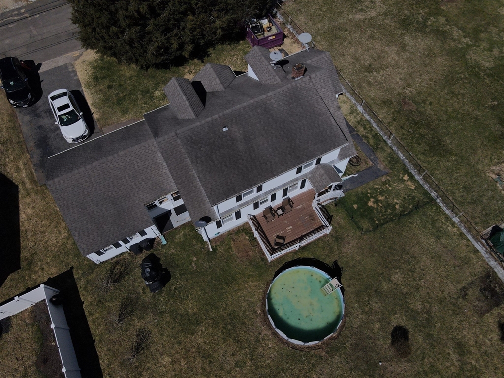 25 A Street Warren, MA 01092 - Photo 34 of 36 an aerial view of a house with a yard