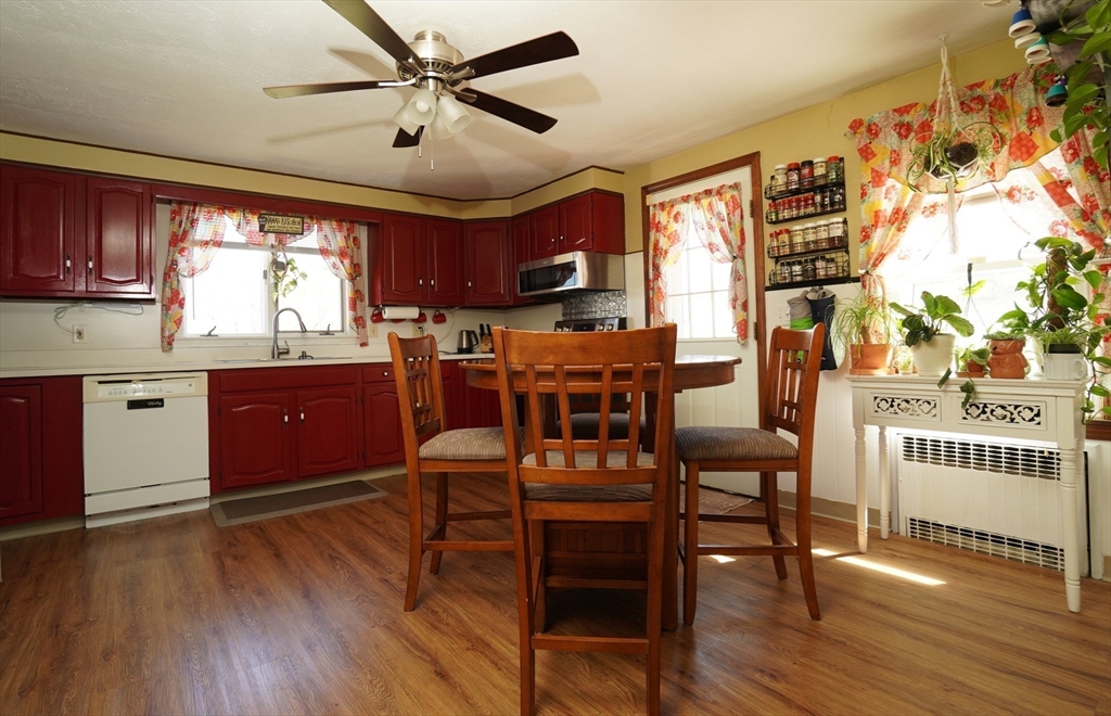 25 A Street Warren, MA 01092 - Photo 8 of 36 a view of a kitchen and dining room