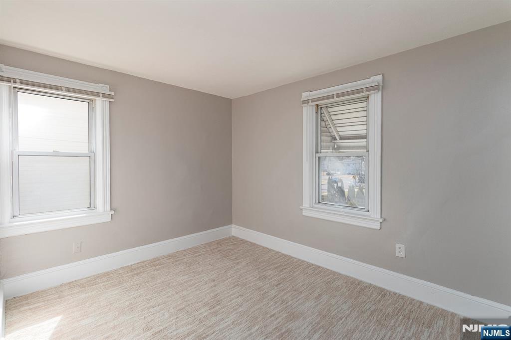 2557 Wh Mer Road Hamilton, NJ 08619 - Photo 24 of 36 an empty room with windows