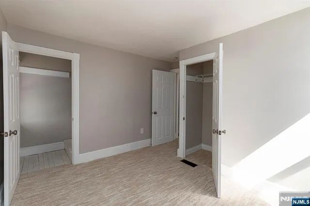 a view of balcony with wooden floor