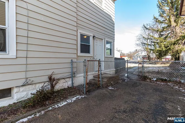 a view of a backyard with a garden