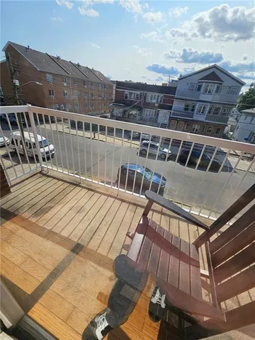 a view of a balcony with city view