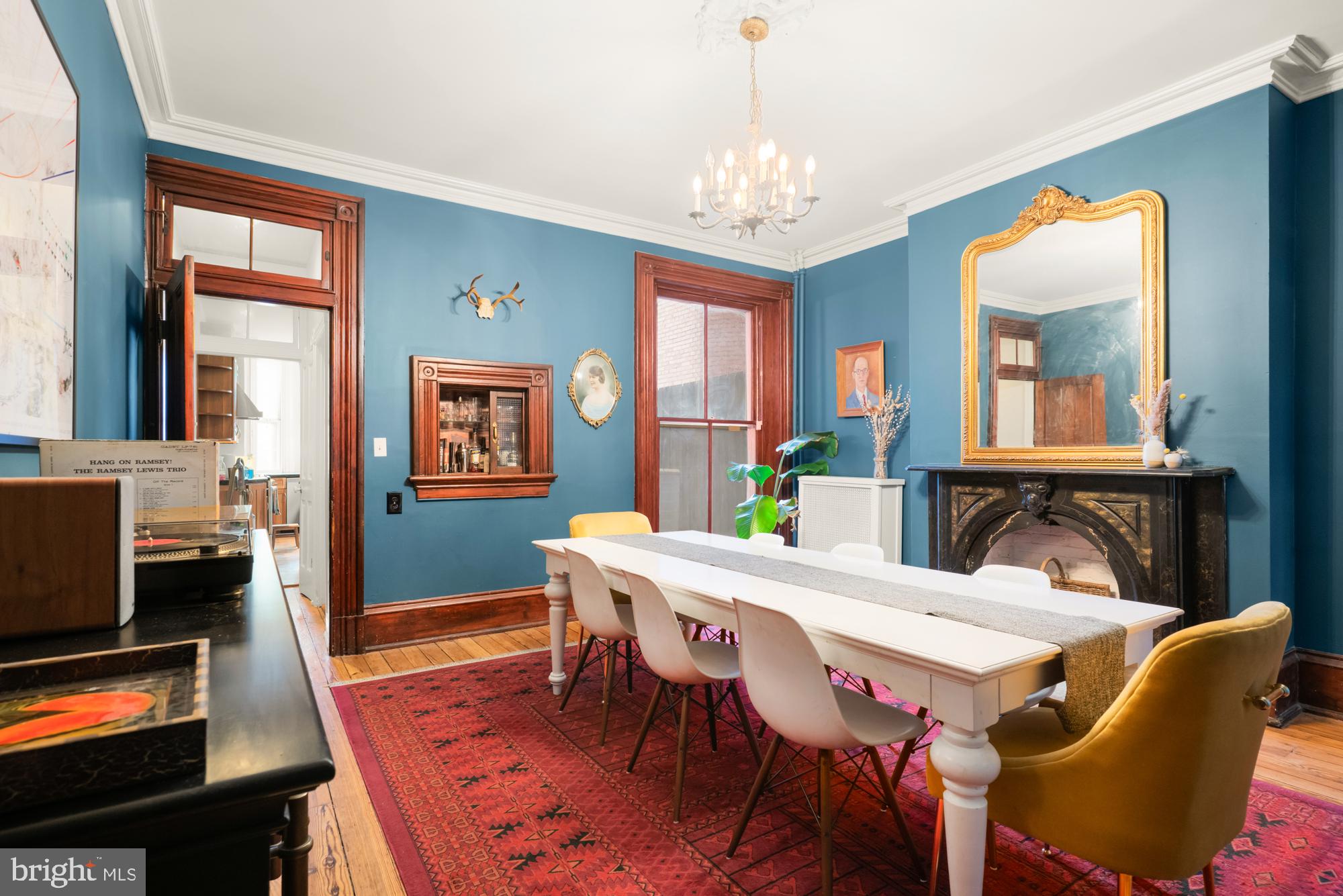 1206 John Street Baltimore, MD 21201 - Photo 12 of 53 a view of a dining room with furniture window and wooden floor