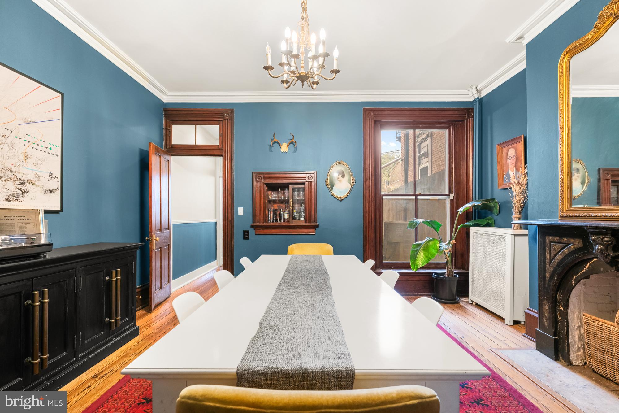 1206 John Street Baltimore, MD 21201 - Photo 13 of 53 a living room with furniture rug and wooden floor