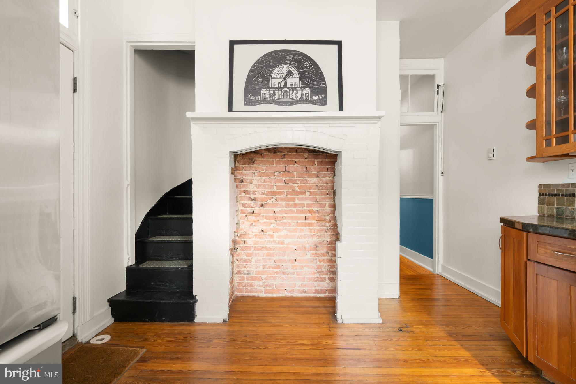 1206 John Street Baltimore, MD 21201 - Photo 19 of 53 a view of entryway and hall with wooden floor