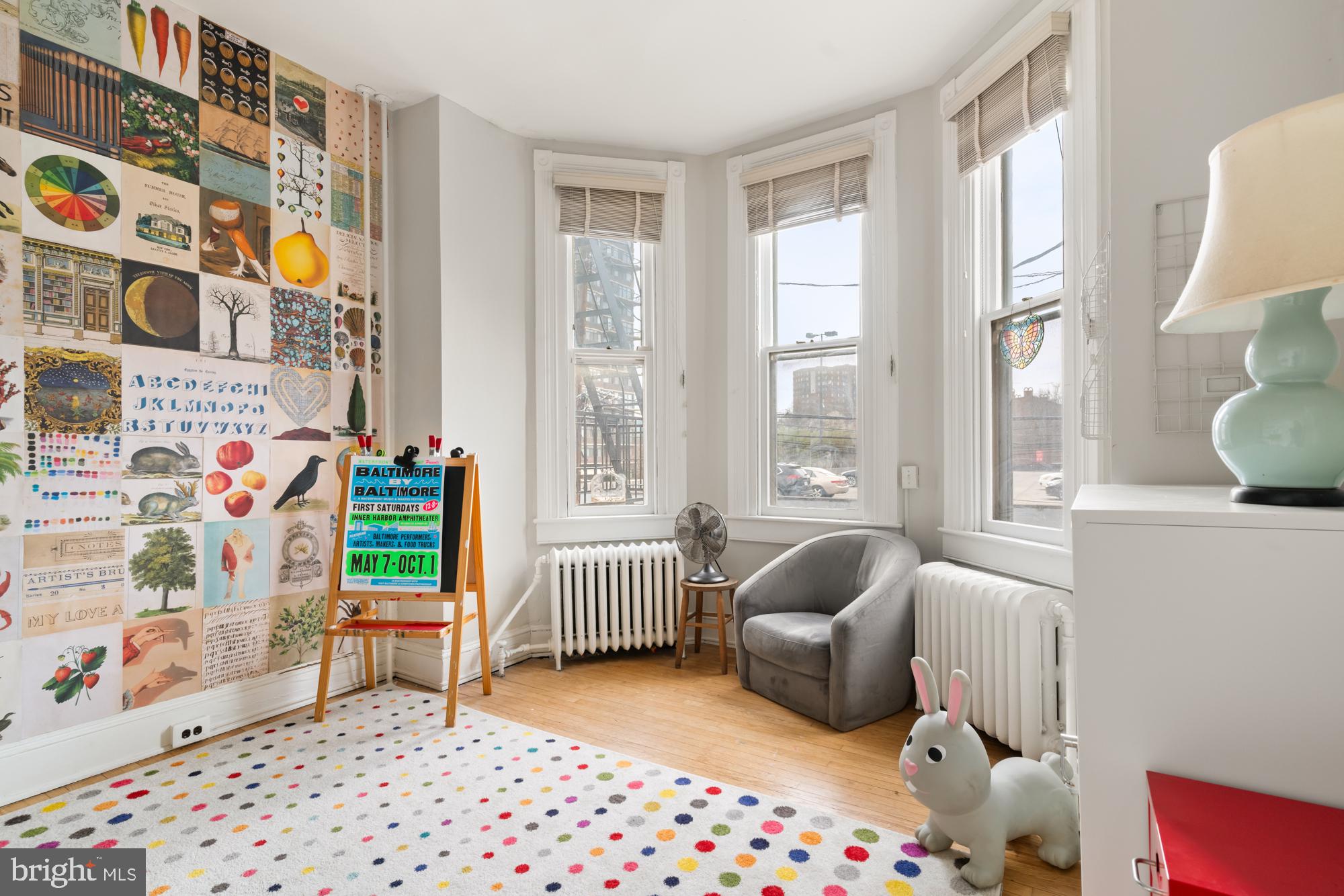 1206 John Street Baltimore, MD 21201 - Photo 32 of 53 a bedroom with furniture and a window