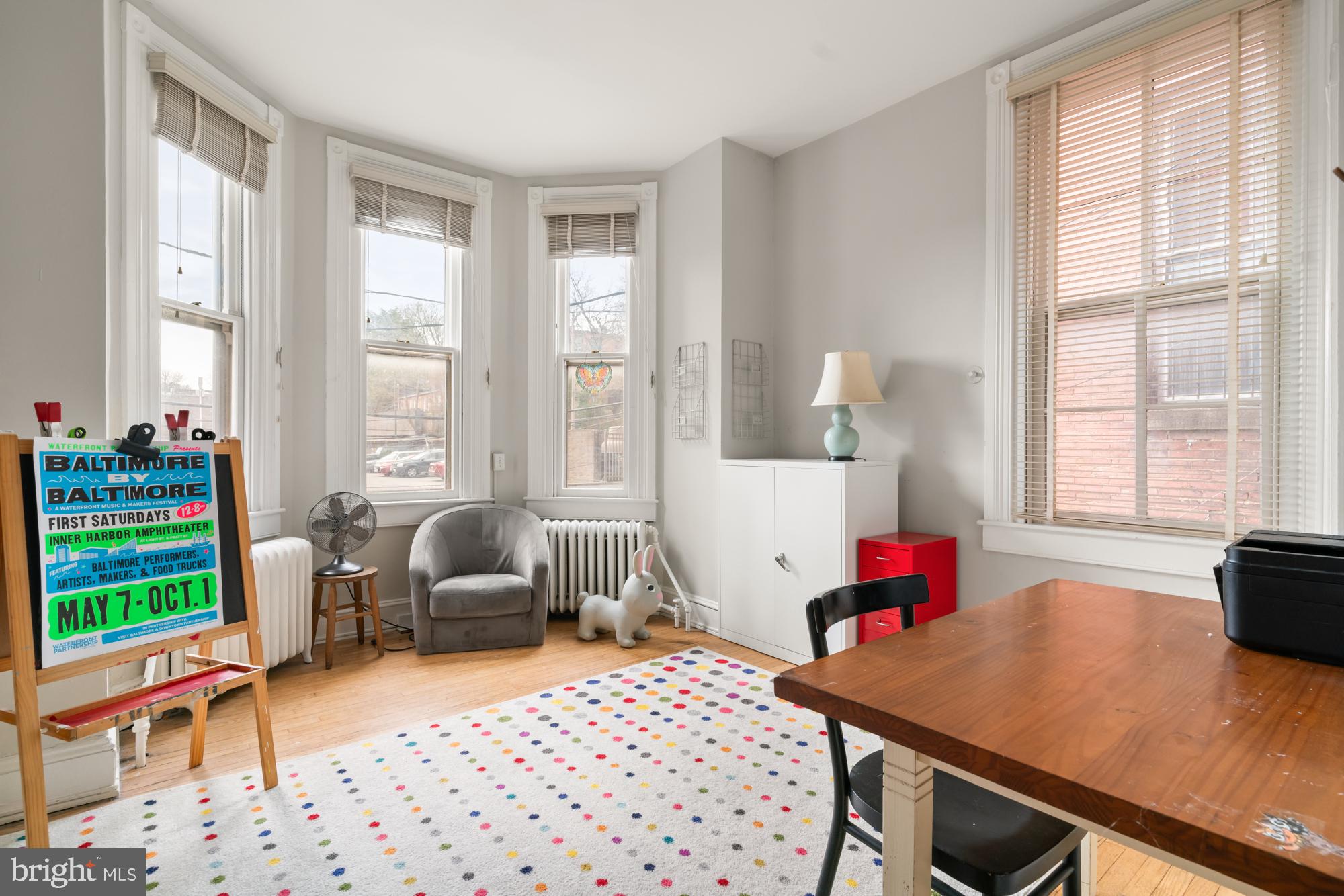 1206 John Street Baltimore, MD 21201 - Photo 33 of 53 a bedroom with a bed and a window