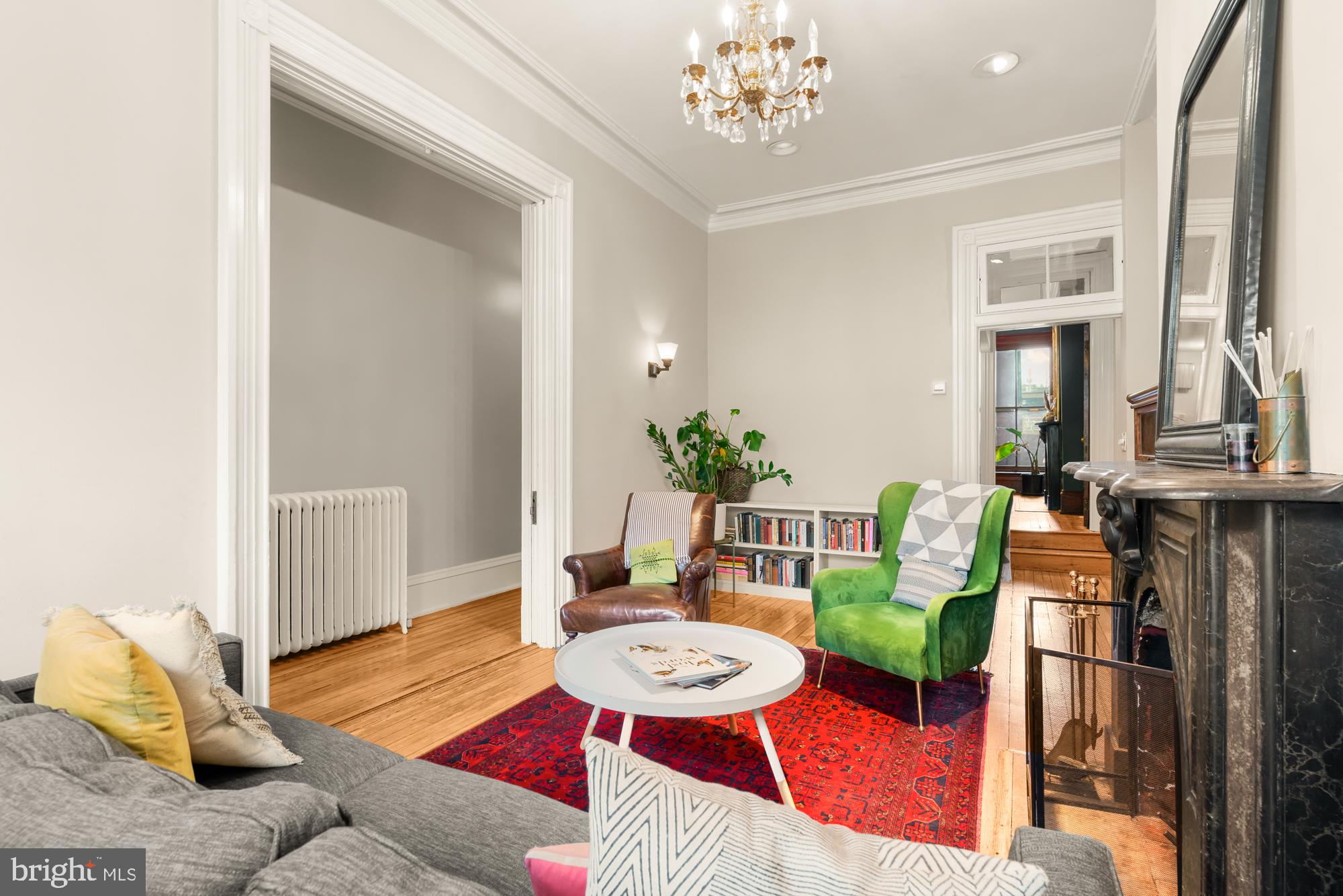 1206 John Street Baltimore, MD 21201 - Photo 7 of 53 a view of a dining room with furniture and wooden floor