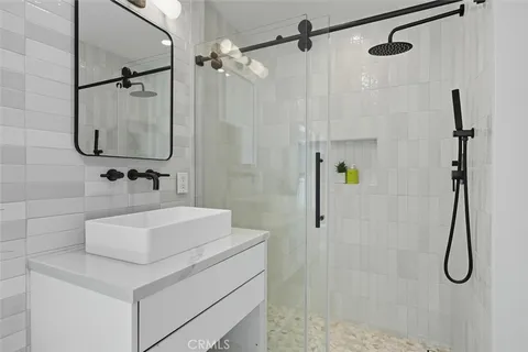 a bathroom with a shower sink