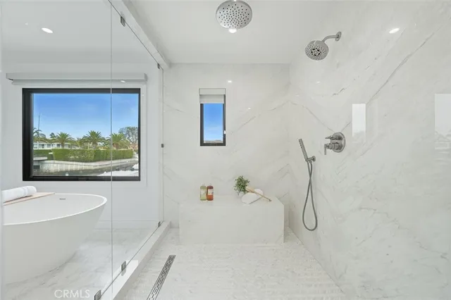 a bathroom with a sink vanity and mirror