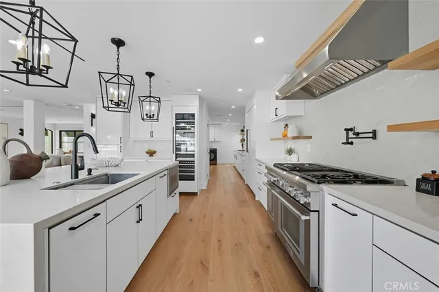 a view of living room with furniture and potted plant