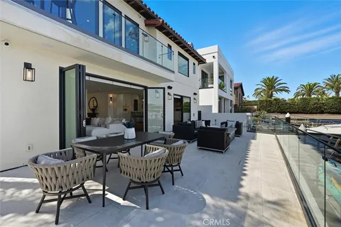 a patio with table and chairs