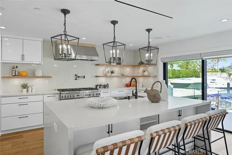 a bedroom with a large bed and a large window