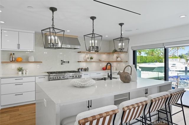 a bedroom with a large bed and a large window