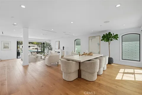 a bedroom with a large bed and a large window