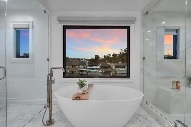 an aerial view of a houses with yard