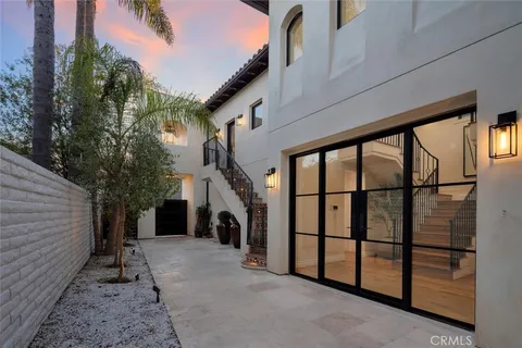 a view of a house with a yard and garage
