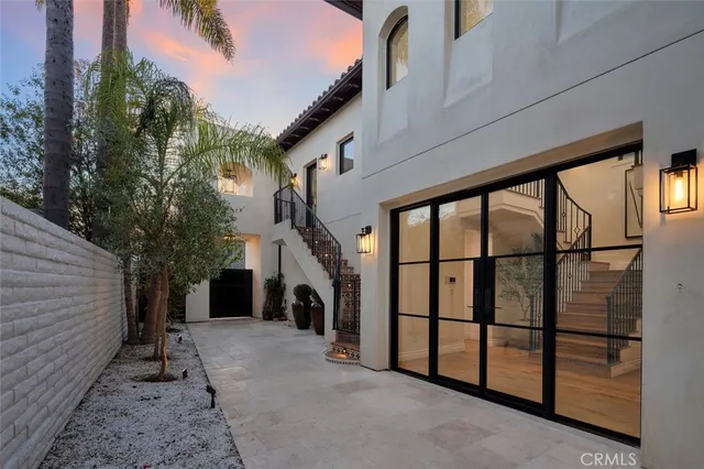 a view of a house with a yard and garage