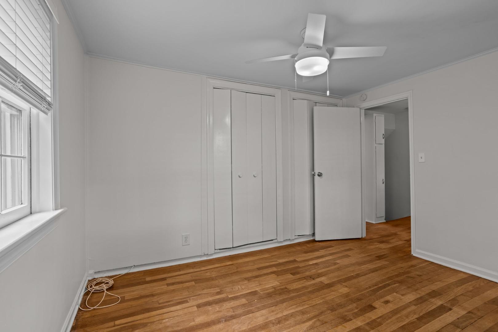 921 St Marys Street Raleigh, NC 27605 - Photo 15 of 42 a view of a room with wooden floor and white walls