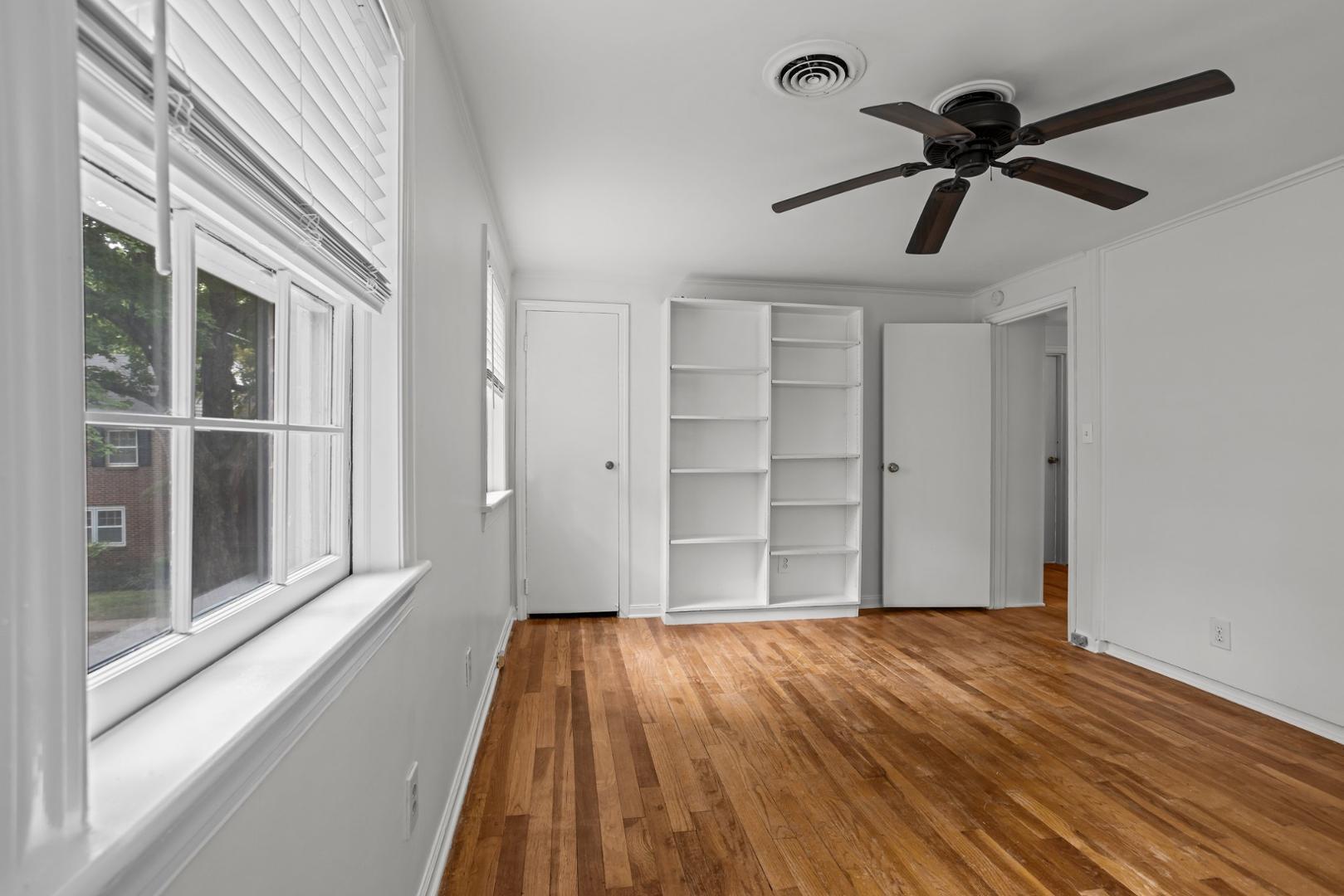 921 St Marys Street Raleigh, NC 27605 - Photo 18 of 42 a view of empty room with wooden floor and window