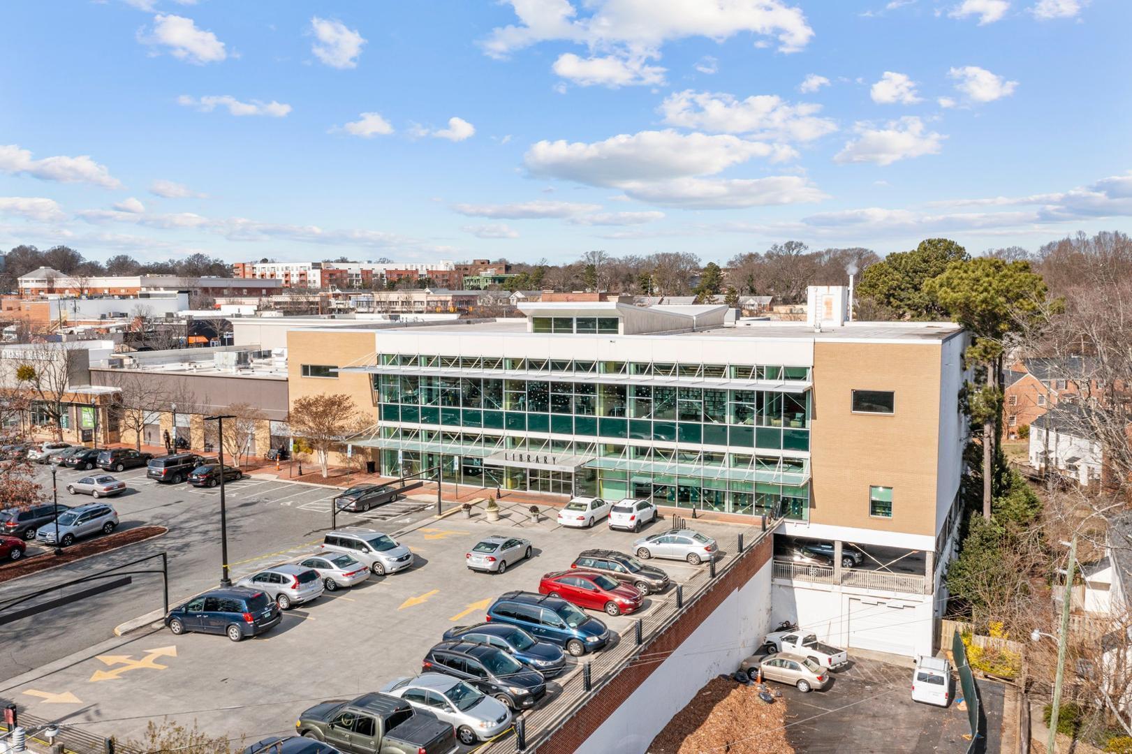 921 St Marys Street Raleigh, NC 27605 - Photo 28 of 42 a view of a terrace with wooden floor and city view