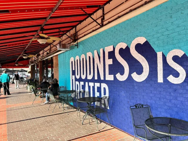 a room with toys and wall painting